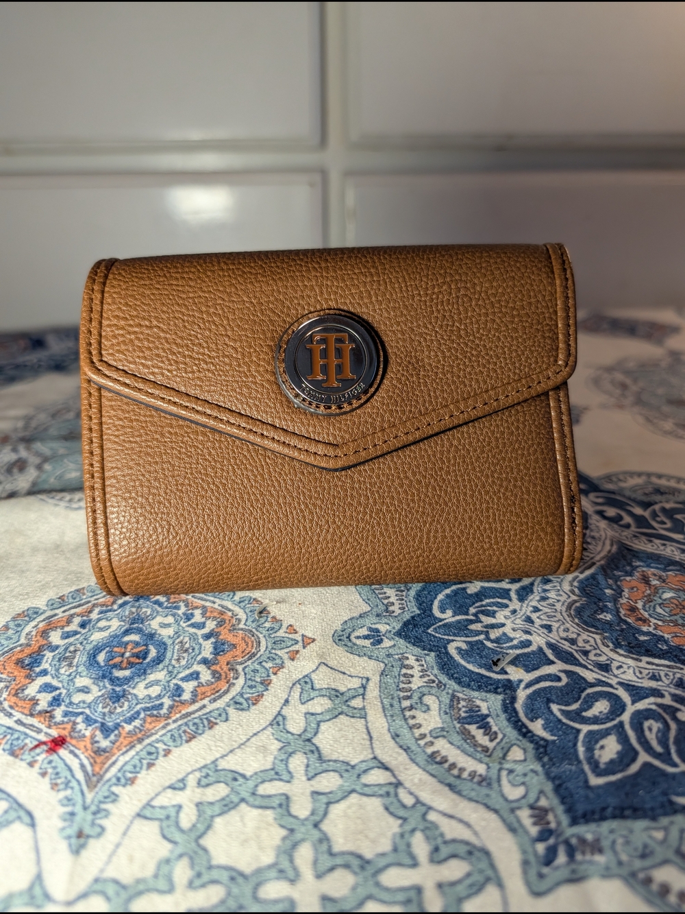 classic | Tommy Hilfiger | tan monogram trifold wallet